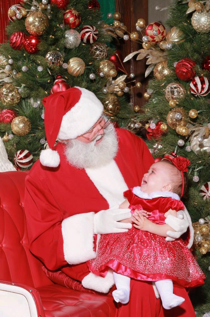 Juliana meets Santa for the first time